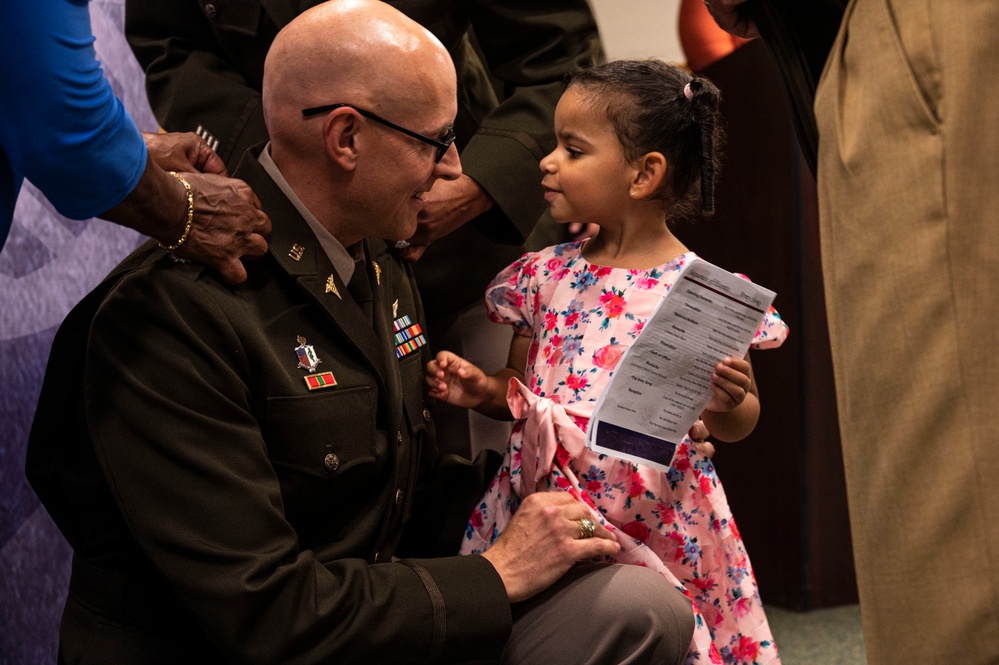 USAMMDA soldiers, family, friends gather for promotion ceremony