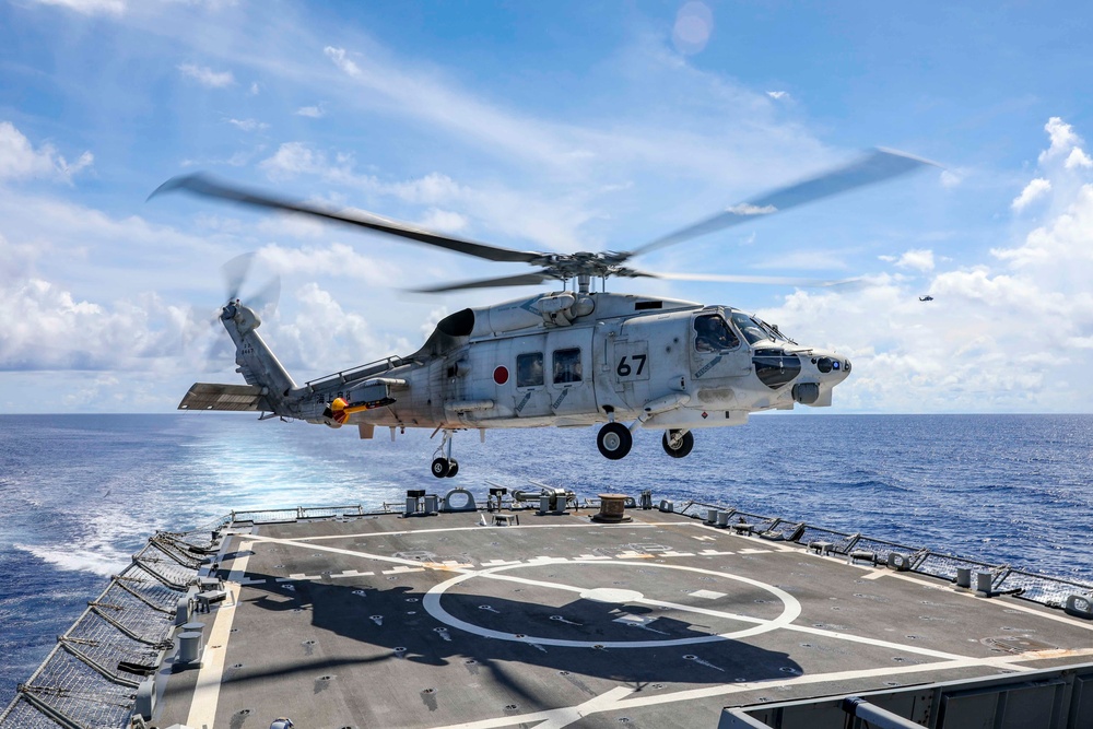 Japanese Helicopter Conducts Operations With USS Higgins