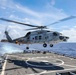 Japanese Helicopter Conducts Operations With USS Higgins