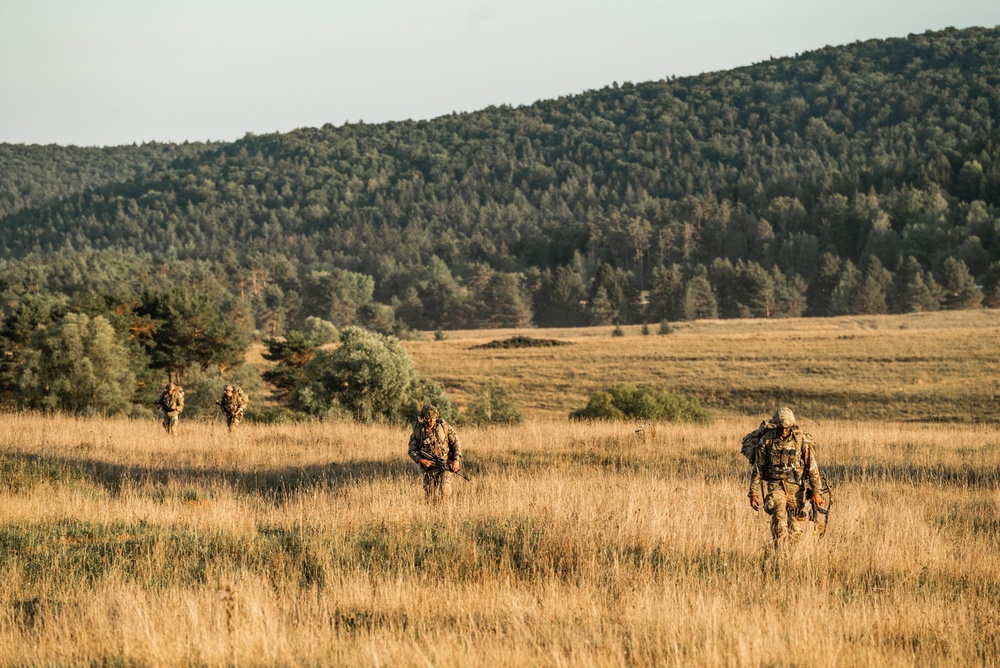 173rd IBCT (ABN) paratroopers march to rally point