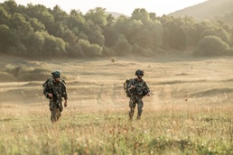 173rd IBCT (ABN) paratroopers march to meet-up point