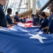 Future Sailors Fold the Ensign