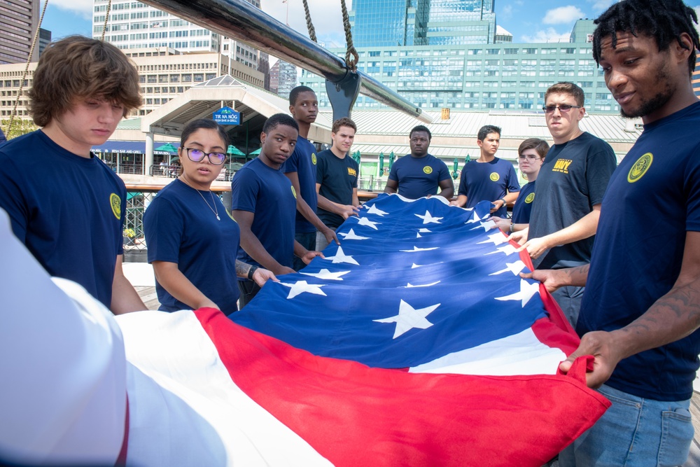 Future Sailors Fold the Ensign Aboard USS Constellation