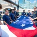 Future Sailors Fold the Ensign Aboard USS Constellation