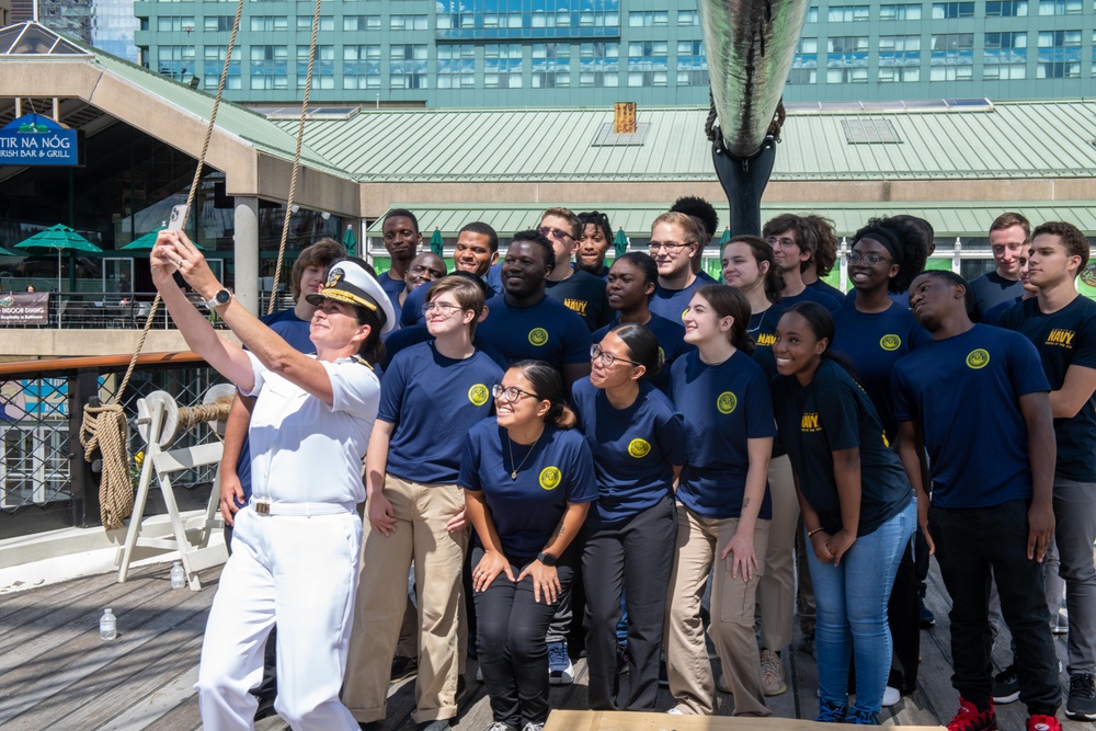 Rear Adm. Lacore Takes Selfie with Future Sailors