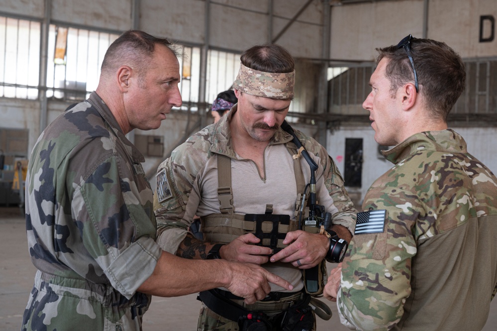 USAF PJs jumping with French paratroopers