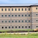 Final exterior grading takes place at fiscal year 2020-funded barracks project at Fort McCoy