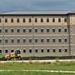 Final exterior grading takes place at fiscal year 2020-funded barracks project at Fort McCoy