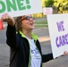 Joint Base MDL leadership promote suicide prevention awareness one sign at a time