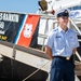 Seaman Apprentice Matthew Forrester Stands Watch Next to USCGC James Rankin
