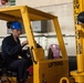 USS Ronald Reagan (CVN 76) Sailors on load cargo in hangar bay