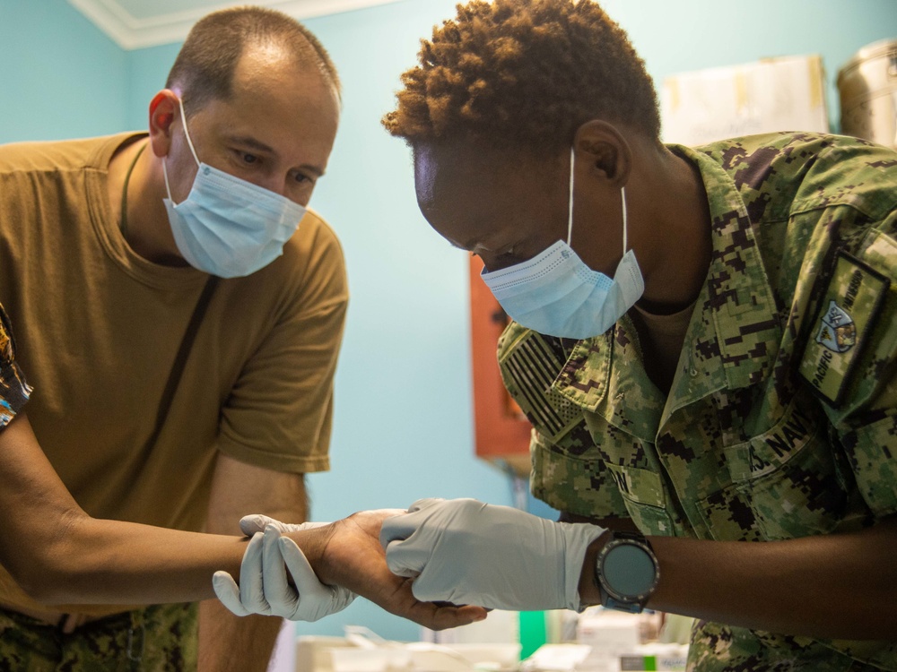 U.S. Navy Sailors assist at the Solomon Islands National Referral Hospital