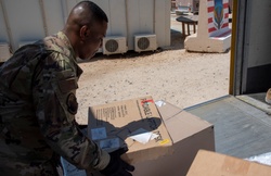 332d Post Office Processes Shipments [Image 1 of 3]