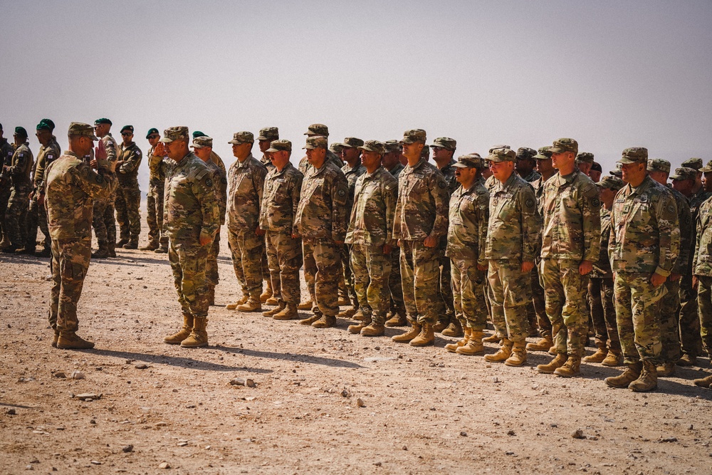 Task Force Spartan soldiers stand in formation during the opening ceremony for Exercise Eager Lion 2022