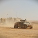 A High Mobility Multipurpose Wheeled Vehicle (HMMWV) drives through a situational training exercise (STX) during Exercise Eager Lion in Jordan, Sept. 8, 2022