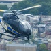 A Eurocopter EC120 Colibri Helicopter Flies Over Baltimore During Maryland Fleet Week