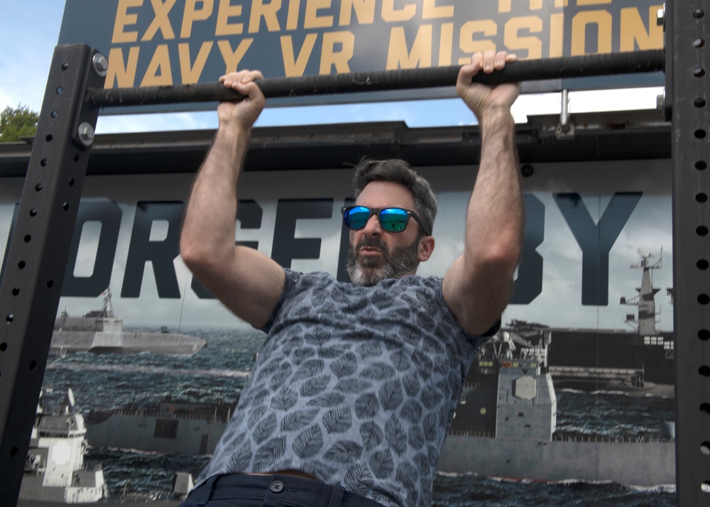 Air Force Veteran Participates in a Pull-up Challenge During Maryland Fleet Week