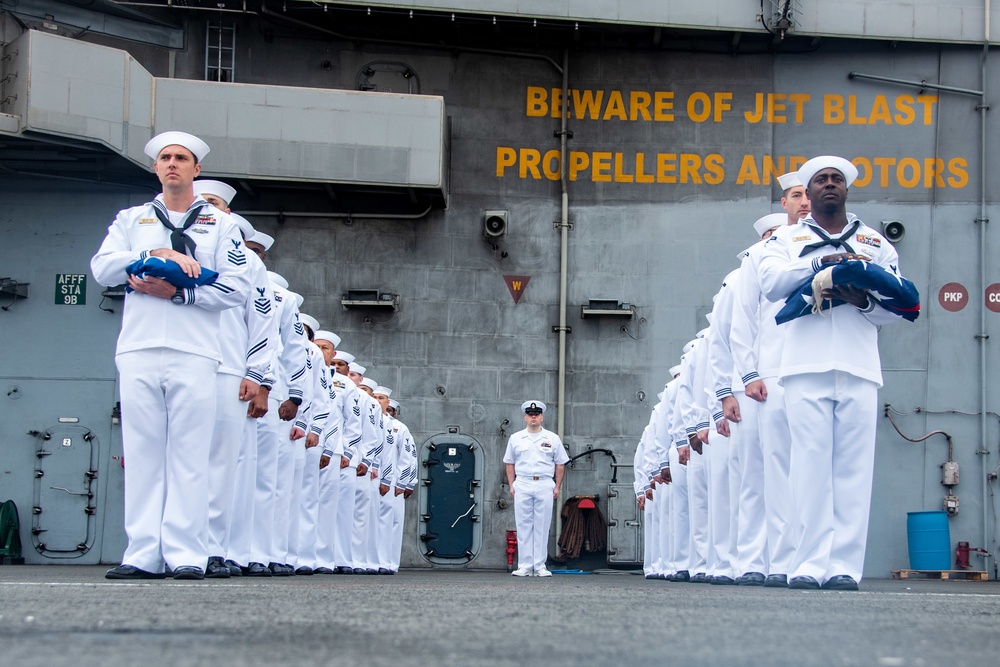 USS Ronald Reagan (CVN 76) Conducts Morning Colors