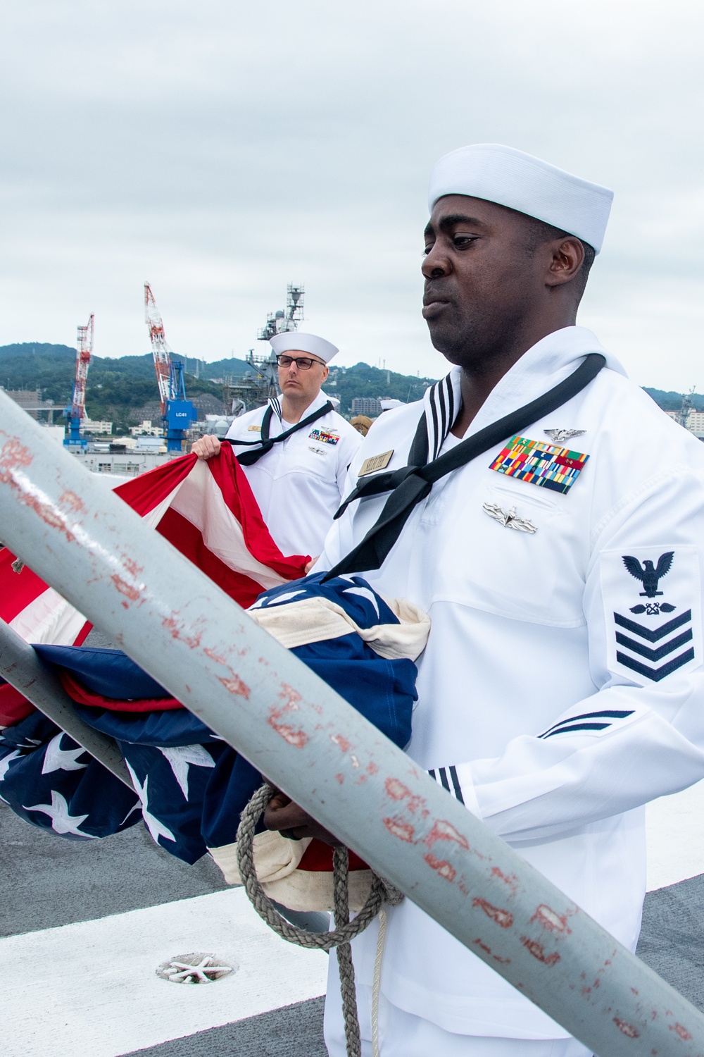 USS Ronald Reagan (CVN 76) Conducts Morning Colors