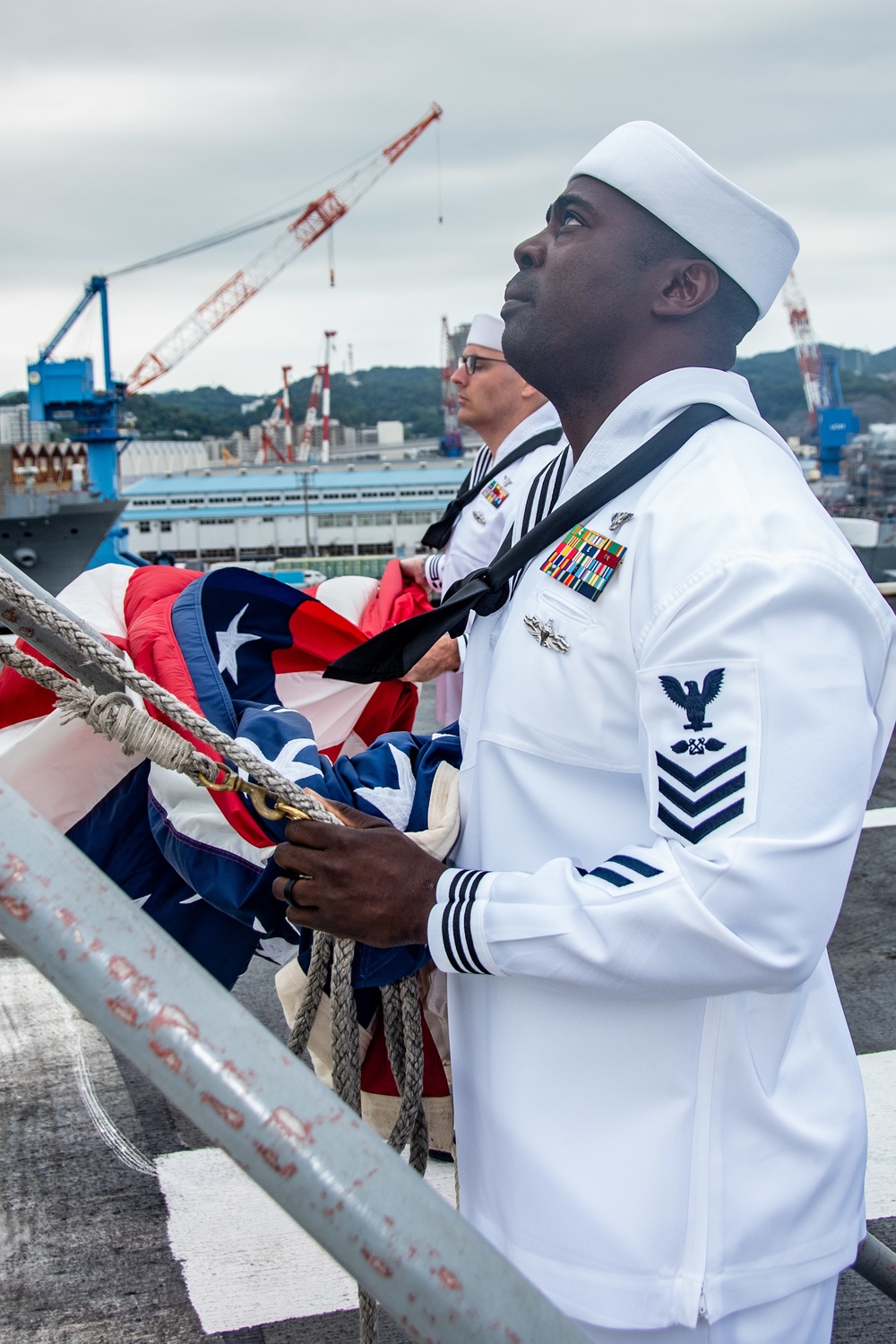 USS Ronald Reagan (CVN 76) Conducts Morning Colors