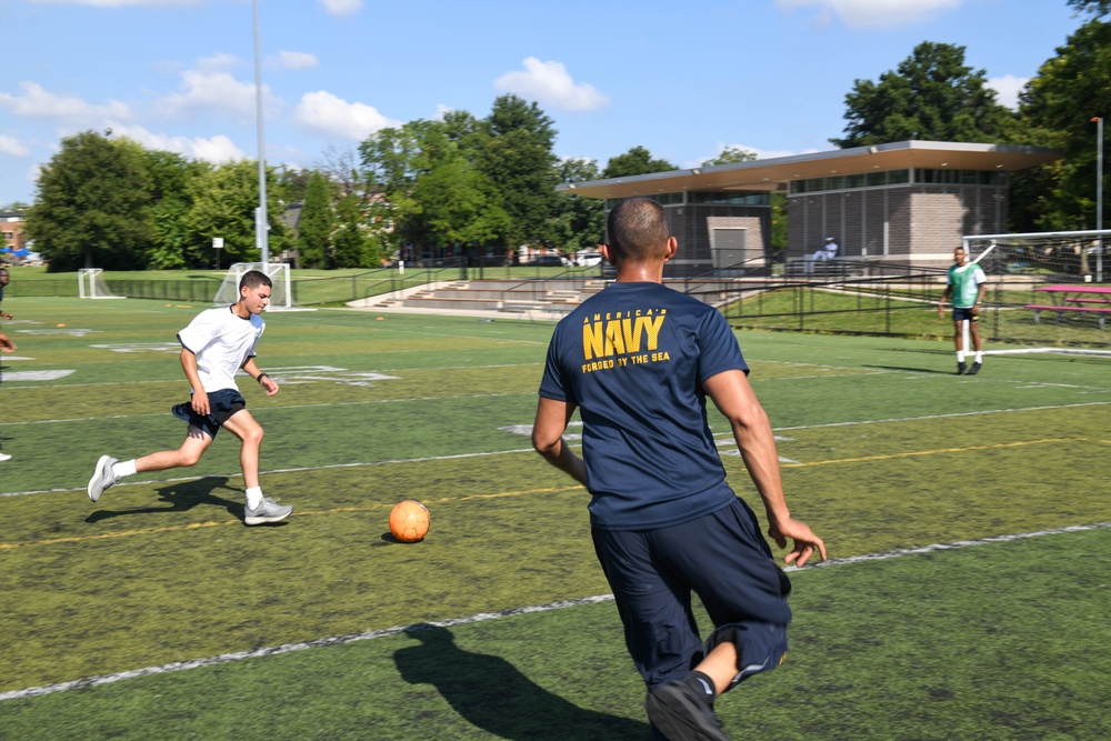 U.S. Service members play soccer at Latrobe Park in Baltimore during Maryland Fleet Week