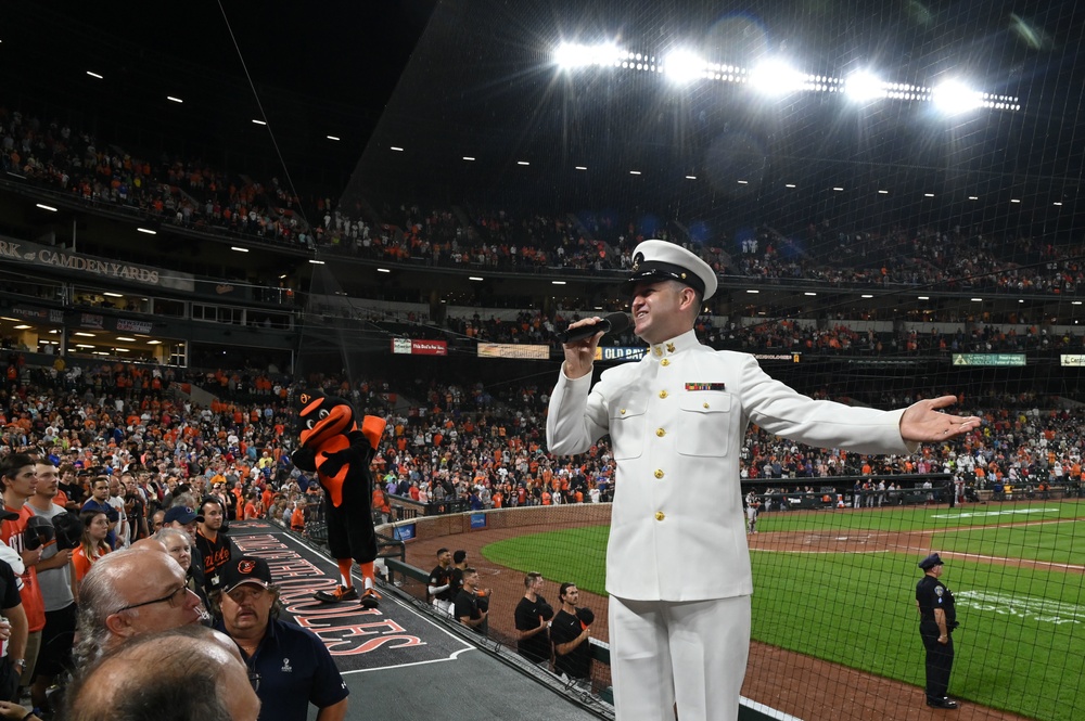 Navy Musician sings for the opening Ceremony at Camden Yards