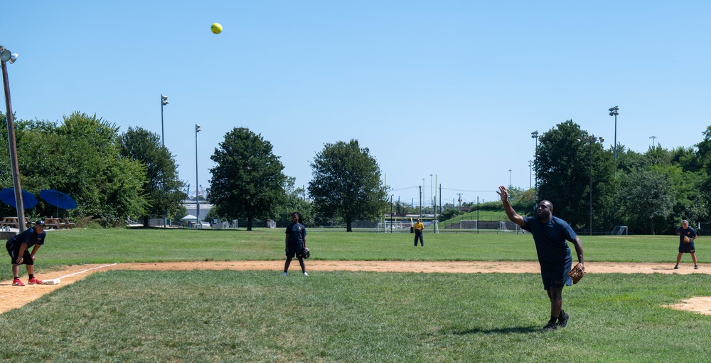 U.S. Service members play softball at Latrobe Park in Baltimore during Maryland Fleet Week