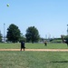 U.S. Service members play softball at Latrobe Park in Baltimore during Maryland Fleet Week