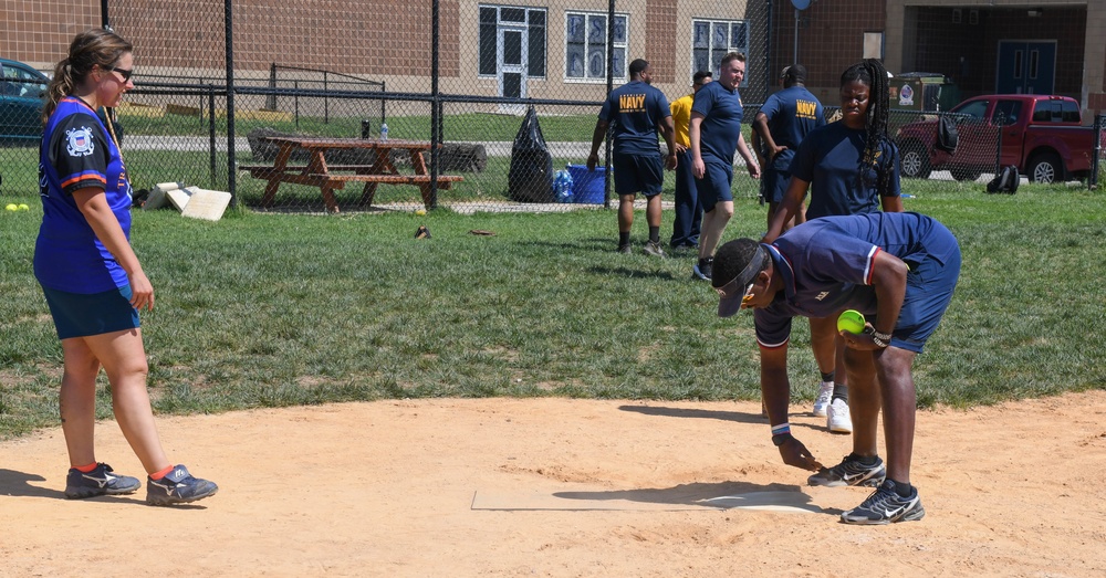 U.S. Service members play softball at Latrobe Park in Baltimore during Maryland Fleet Week