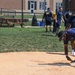 U.S. Service members play softball at Latrobe Park in Baltimore during Maryland Fleet Week