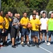 U.S. Service members take photo after basketball game at Latrobe Park in Baltimore during Maryland Fleet Week