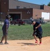 U.S. Service members play softball at Latrobe Park in Baltimore during Maryland Fleet Week