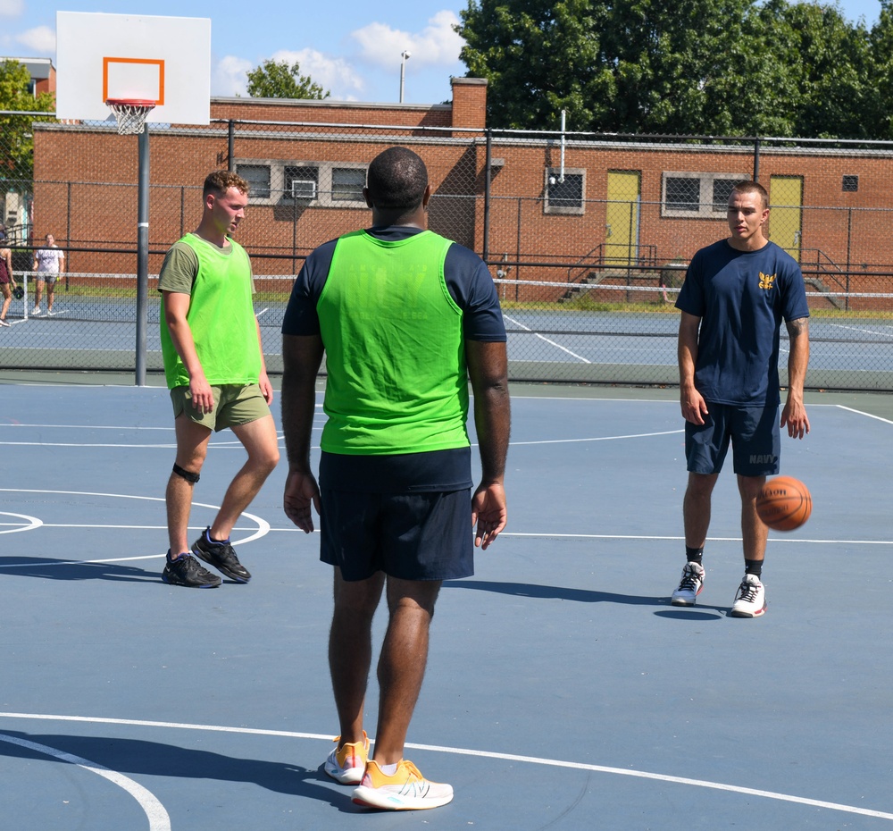 U.S. Service members play basketball at Latrobe Park in Baltimore during Maryland Fleet Week