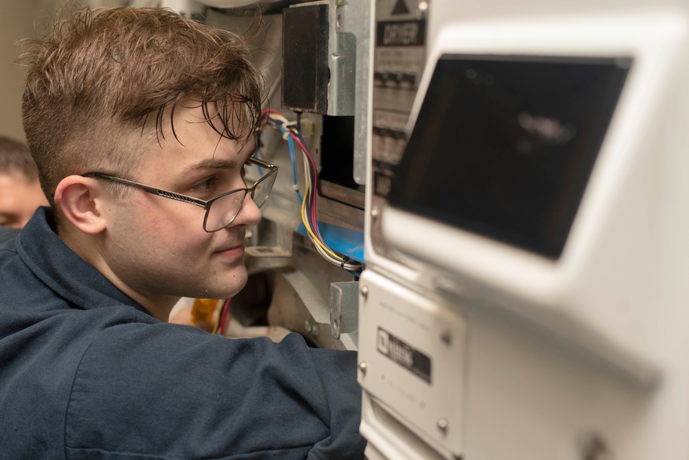 Sailors fix washing machines