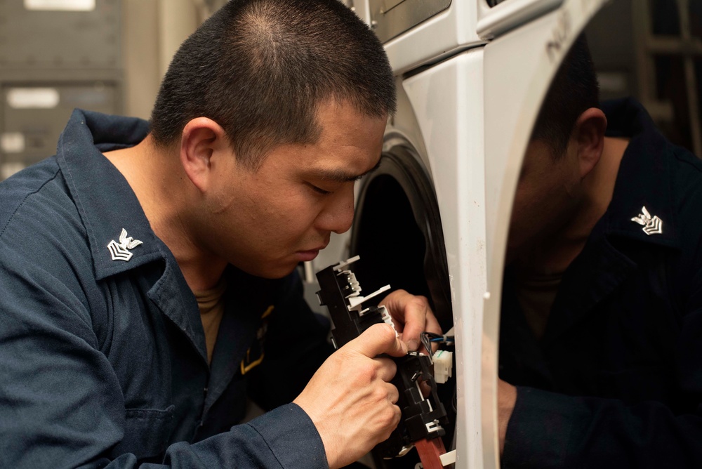 Sailors fix washing machines