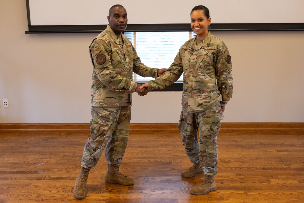 Command Chief Master Sgt. Williams Coins 131st Airmen