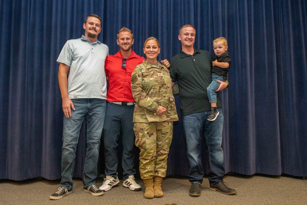 Col. Brian Gunderson promotes Tech. Sgt. Jillian Green to master sergeant