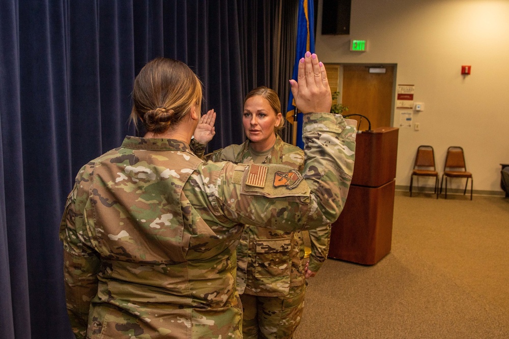 Col. Brian Gunderson promotes Tech. Sgt. Jillian Green to master sergeant