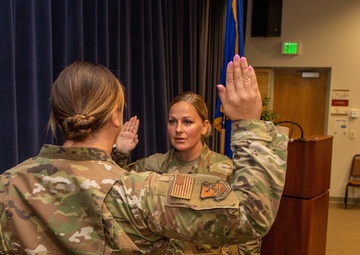 Col. Brian Gunderson promotes Tech. Sgt. Jillian Green to master sergeant