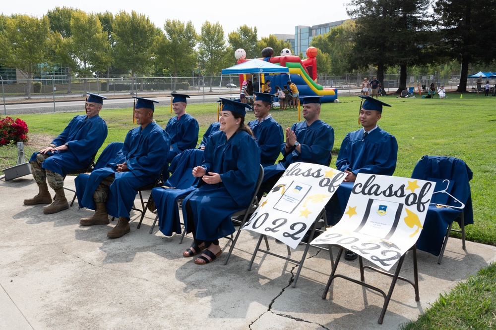 A Career Milestone | 129th Rescue Wing Airmen are recognized for achieving an associate’s degree from the Community College of the Air Force during a commencement ceremony