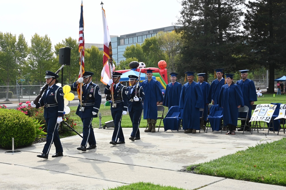 A Career Milestone | 129th Rescue Wing Airmen are recognized for achieving an associate’s degree from the Community College of the Air Force during a commencement ceremony