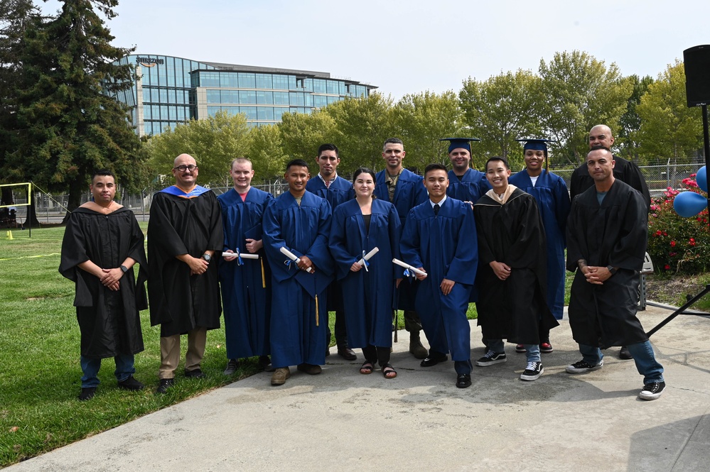 A Career Milestone | 129th Rescue Wing Airmen are recognized for achieving an associate’s degree from the Community College of the Air Force during a commencement ceremony