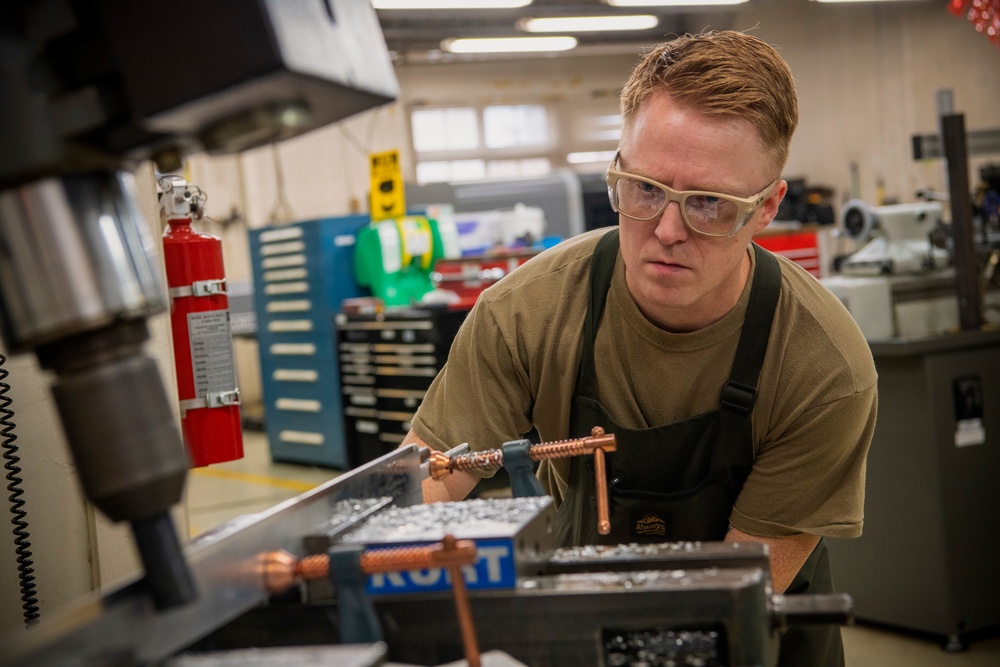 Forged in history: 374th MXS Airman yields new ceremonial sword for Yokota