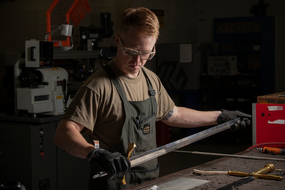 Forged in history: 374th MXS Airman yields new ceremonial sword for Yokota