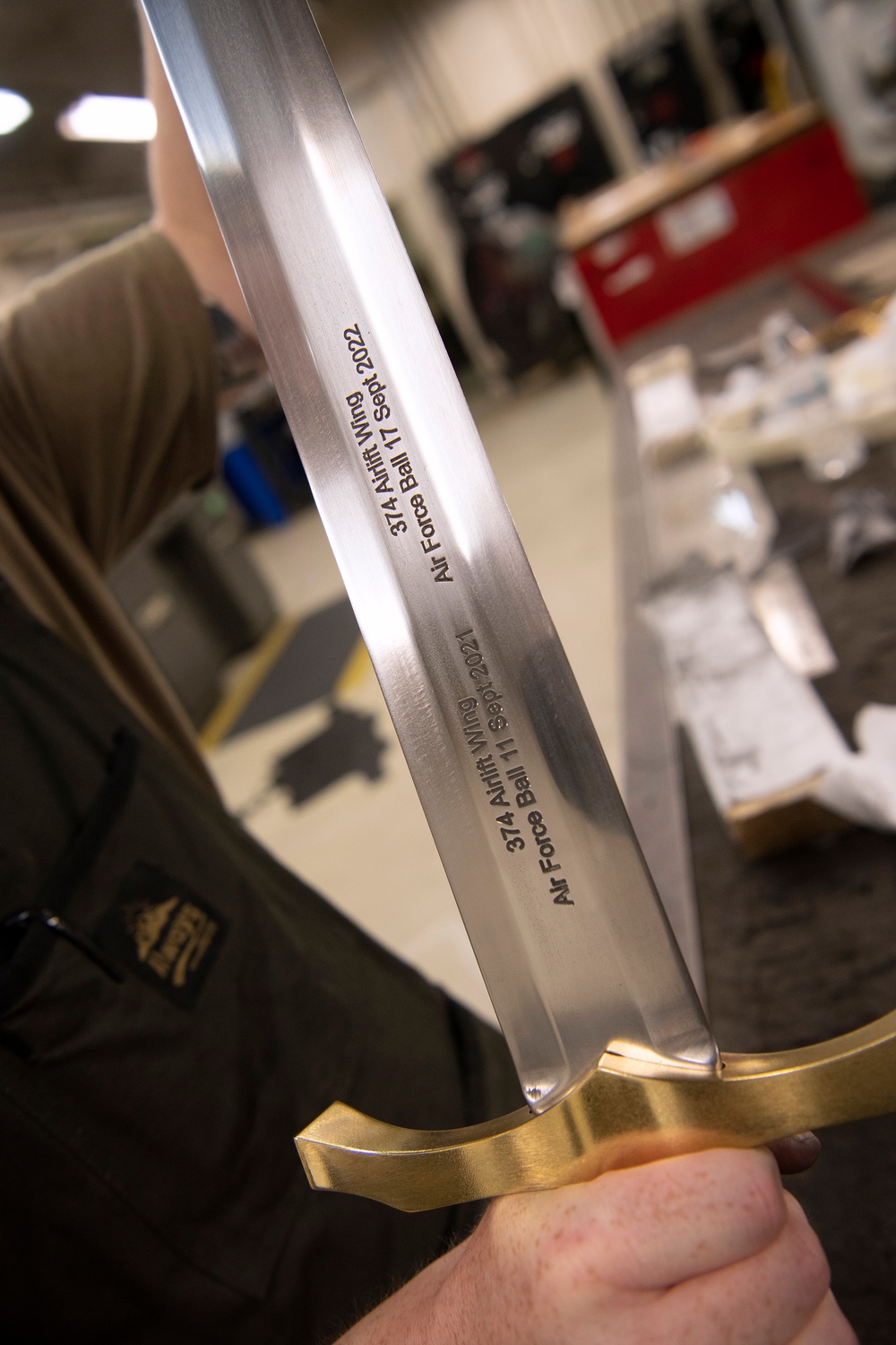 Forged in history: 374th MXS Airman yields new ceremonial sword for Yokota