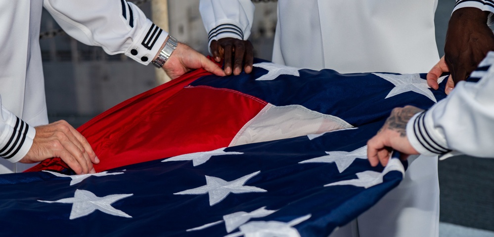 USS Ronald Reagan (CVN 76) Conducts Evening Colors