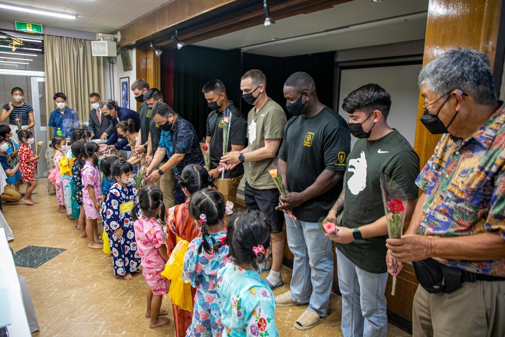 ‘Wolfhounds’ overcome obstacles to continue support for adopted Japanese orphanage