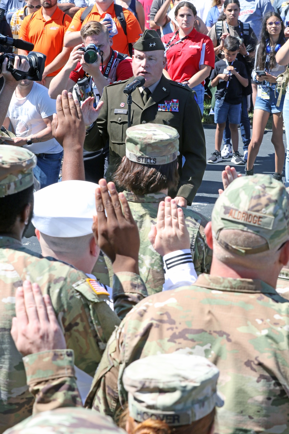 MG Baker performs Oath of Enlistment