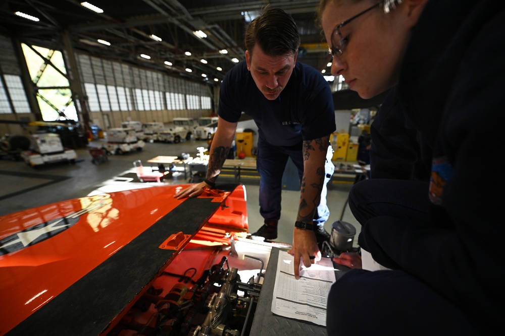 Air Station Kodiak aircrew conducts aircraft maintenance