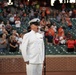 Musician 1st Class Robert A. Kurth sings the National Anthem at Orioles Park to celebrate Maryland Fleet Week